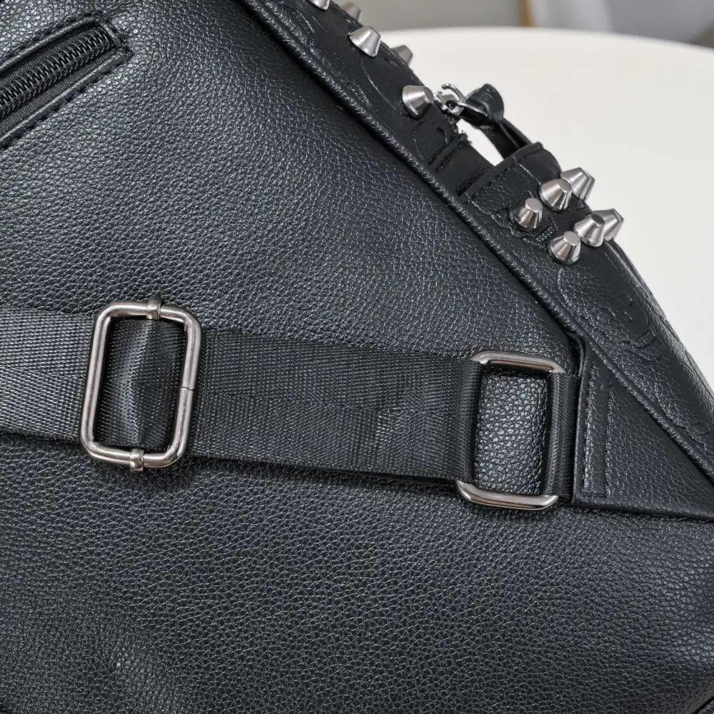 Black PU Backpack with Studded Pockets and Three Dimensional Design - Black