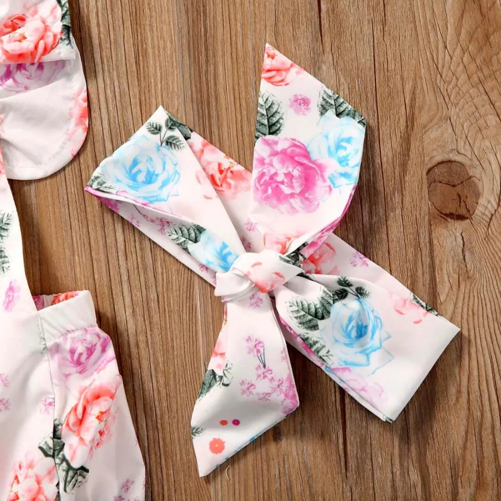 Blossom Ruffle: Infant Floral Two-Piece Suit