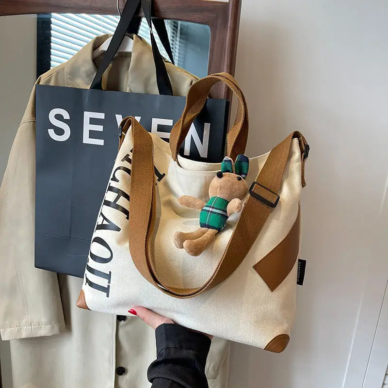 Canvas Shoulder Bag with Pendant and Ribbon Options