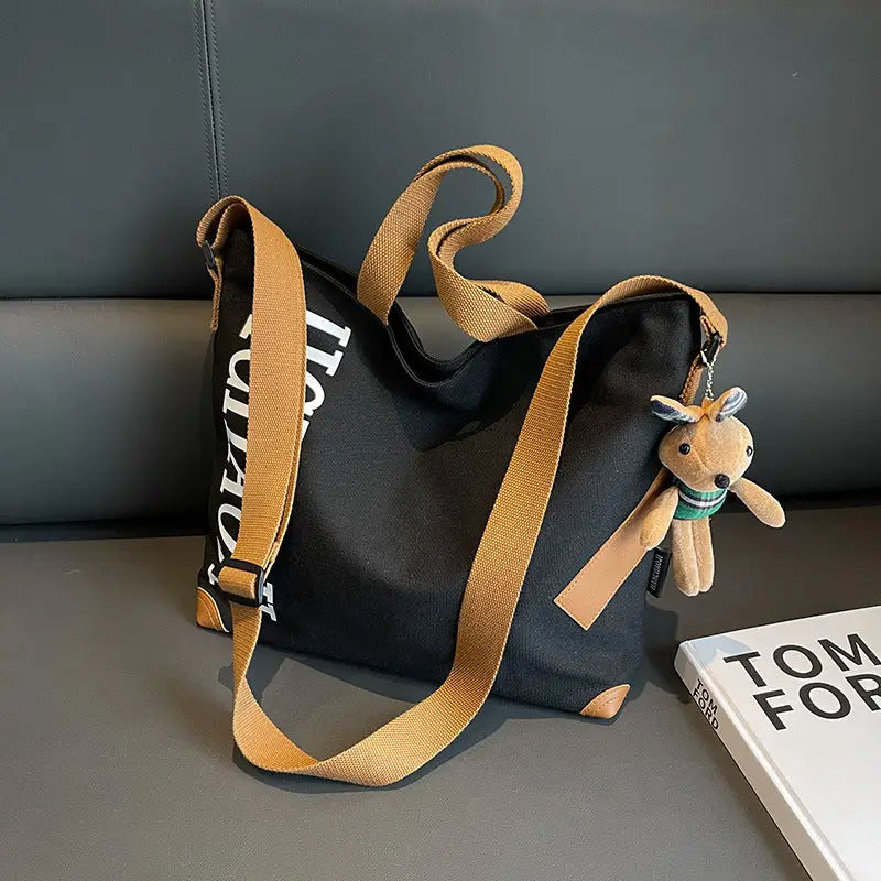 Canvas Shoulder Bag with Pendant and Ribbon Options - Black