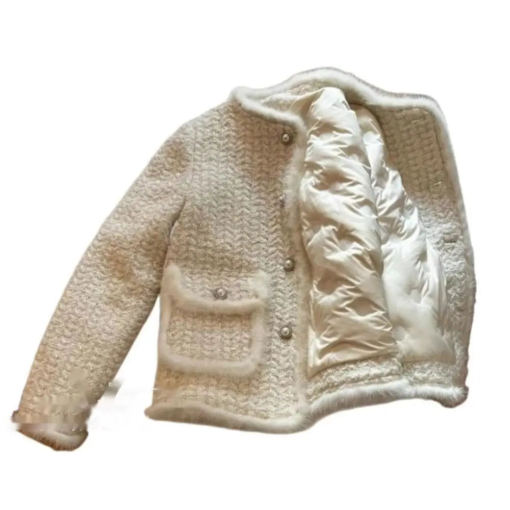 Open white tweed jacket.