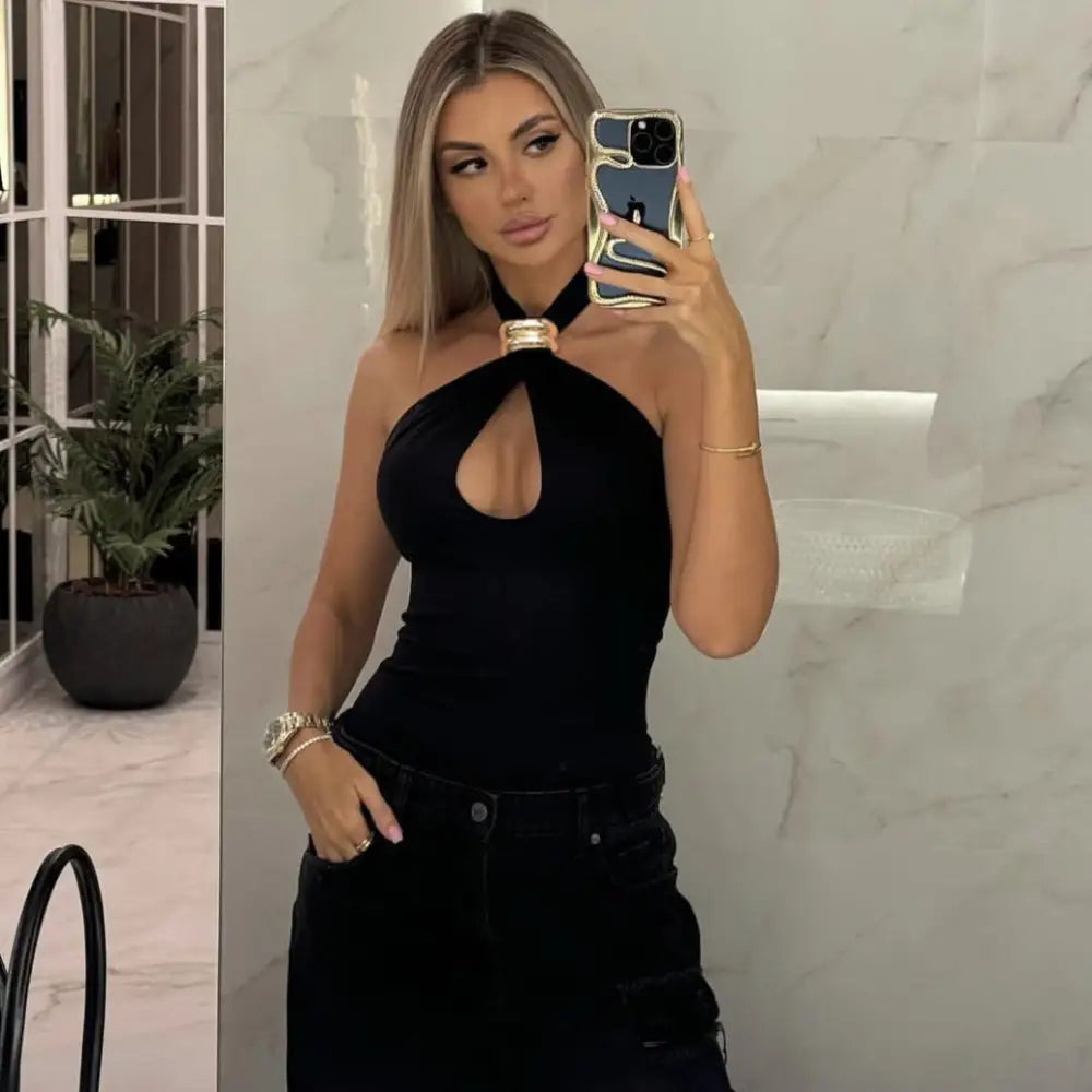 Woman in black halter top.