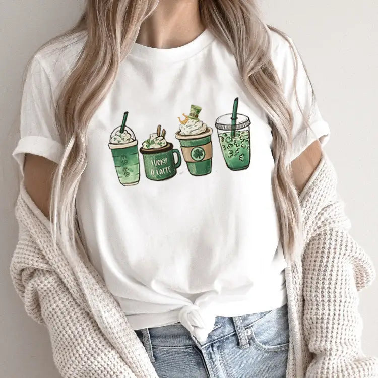 White t-shirt with St. Patrick’s Day themed coffee drinks.