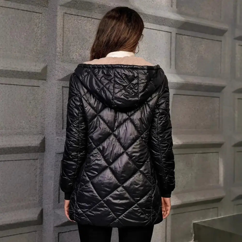 Black quilted hooded jacket.