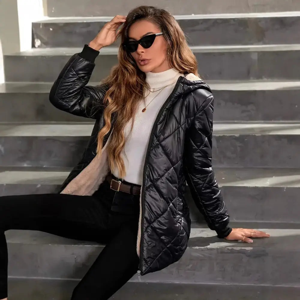 Woman in black quilted puffer coat.