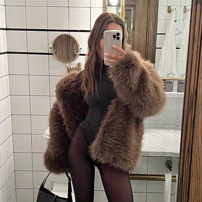 Brown faux fur coat.