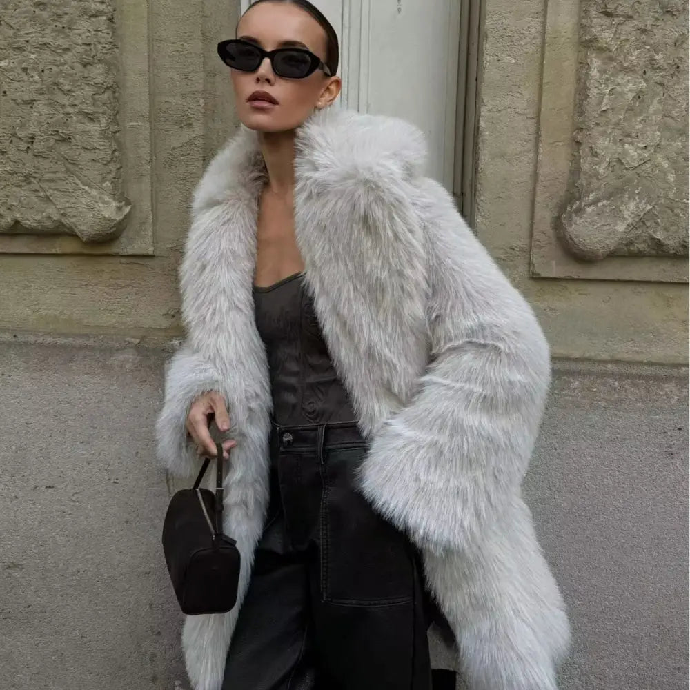 Stylish woman in a faux fur coat.