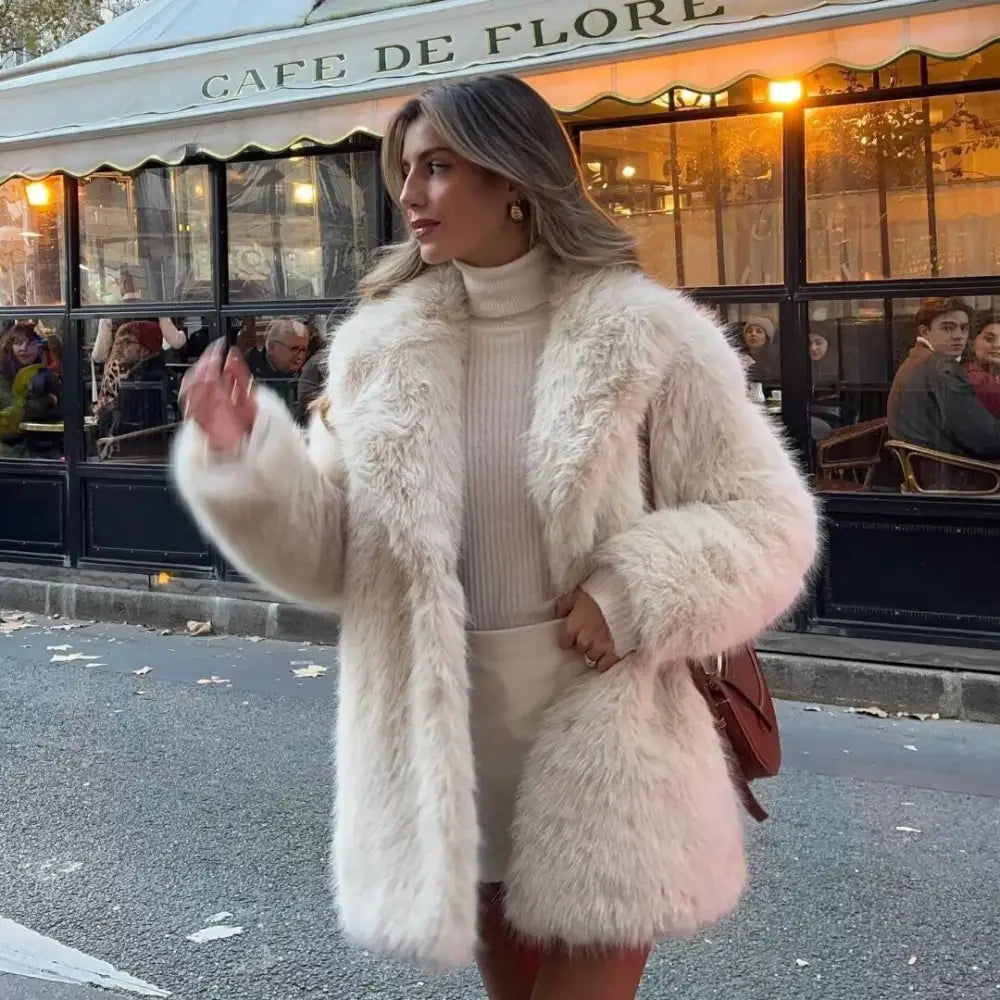 Woman in a fluffy white coat.