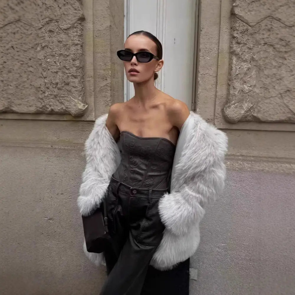 Stylish woman in a fur coat.