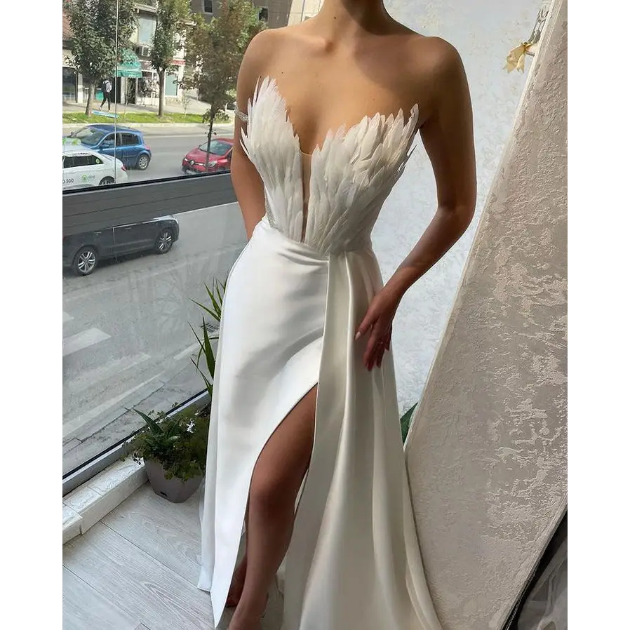 FeatherSweep Elegance Gown