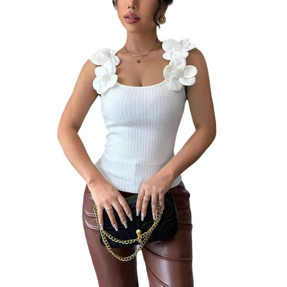 White floral-embellished tank top.