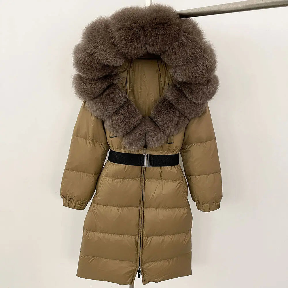Tan puffer coat with fur-trimmed hood and black belt.