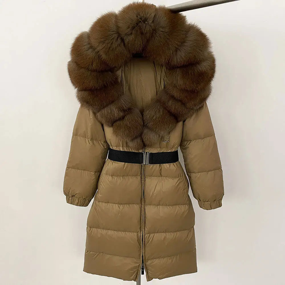 Tan puffer coat with fur-trimmed hood and black belt.