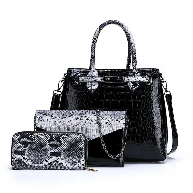 Black and white snakeskin-patterned handbag set.