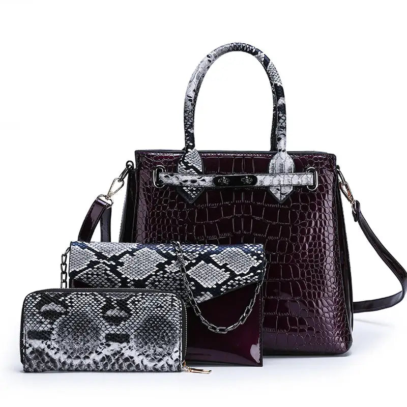 Matching handbag set with reptile patterns.