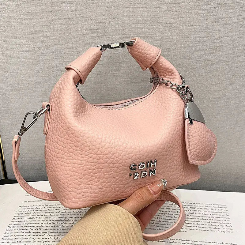 Litchi Luxe: Chic Commuter Messenger Bag