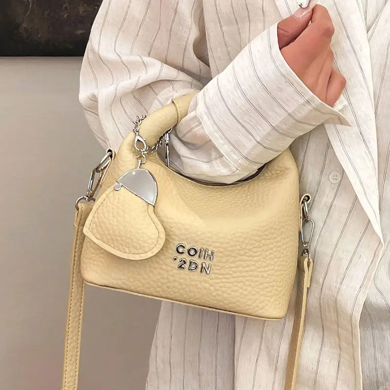 Litchi Luxe: Chic Commuter Messenger Bag