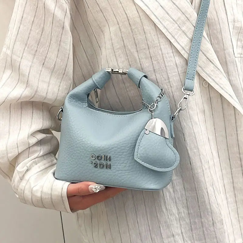 Litchi Luxe: Chic Commuter Messenger Bag