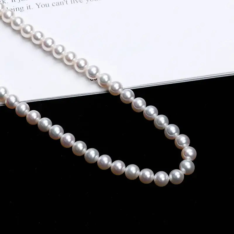 Strand of lustrous pearls.
