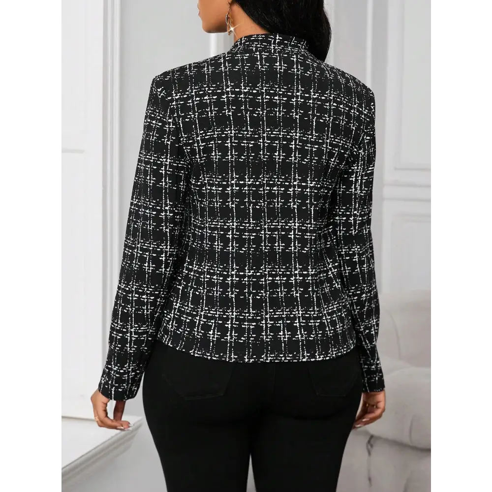 Black and white tweed blazer.