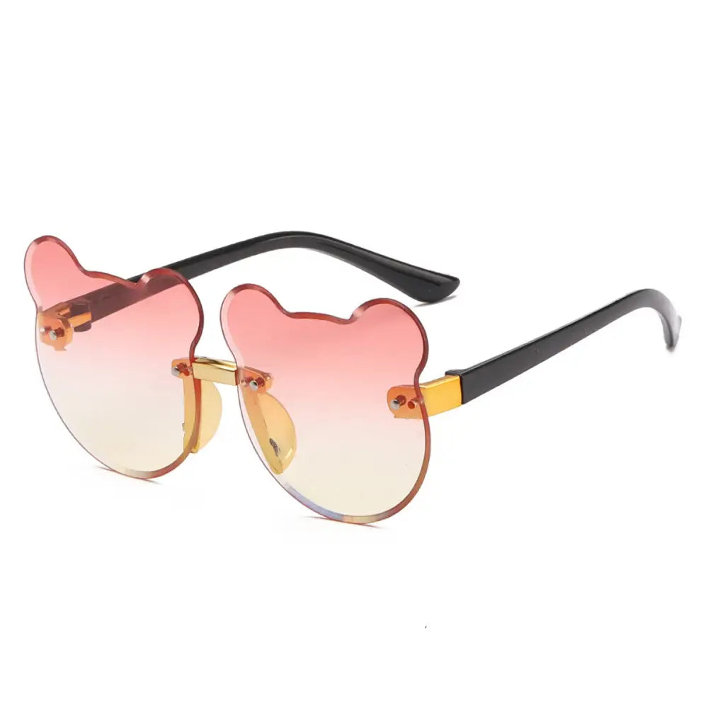 Purrfect Paws: Frameless Cat Ear Sunglasses - Gold frame red and yellow tabl