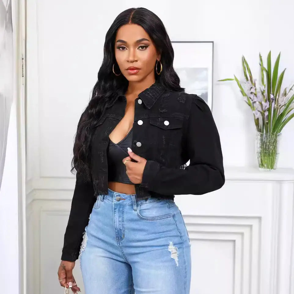 Black cropped denim jacket.