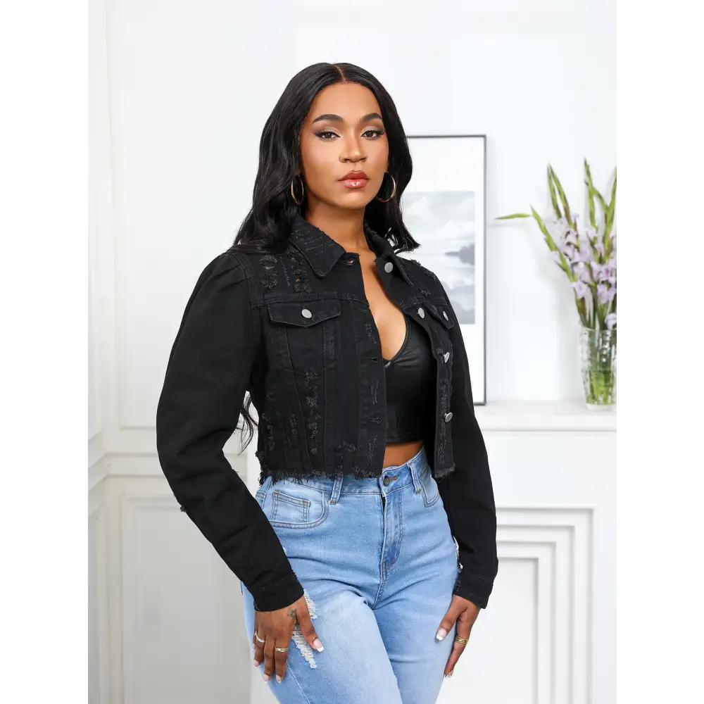 Black cropped denim jacket.