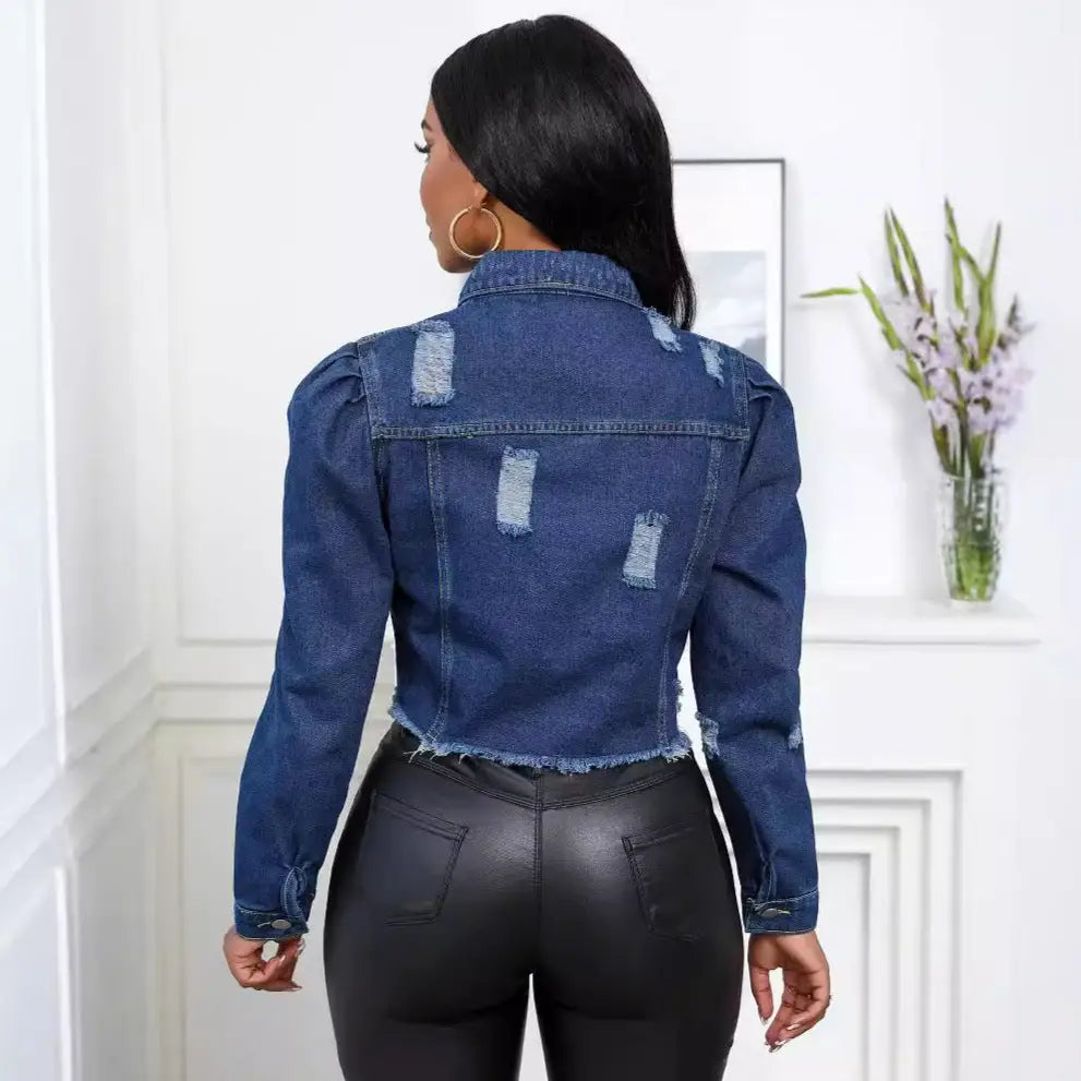 Distressed denim jacket.