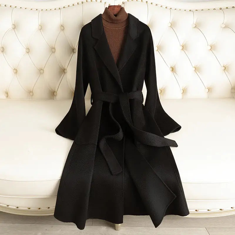 Black belted wool coat.