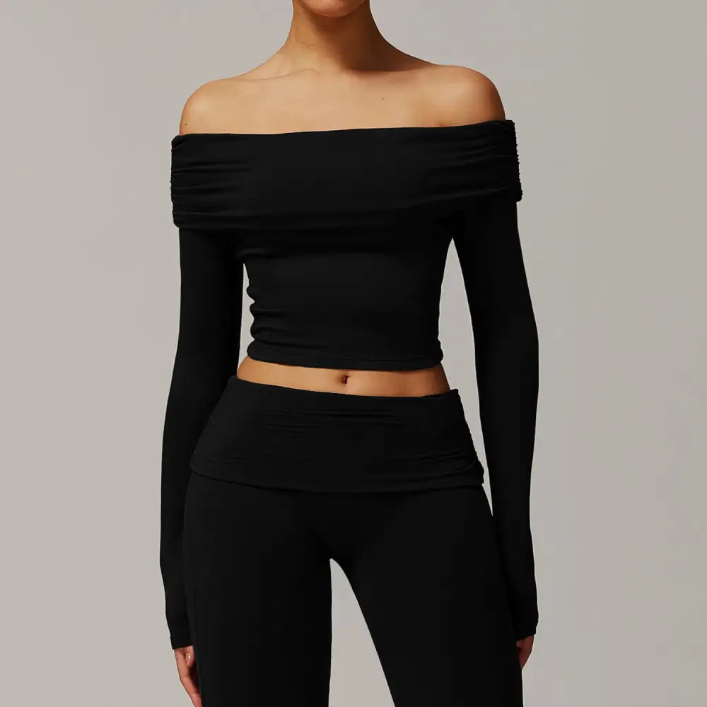 Black off-the-shoulder long-sleeve crop top and matching leggings.