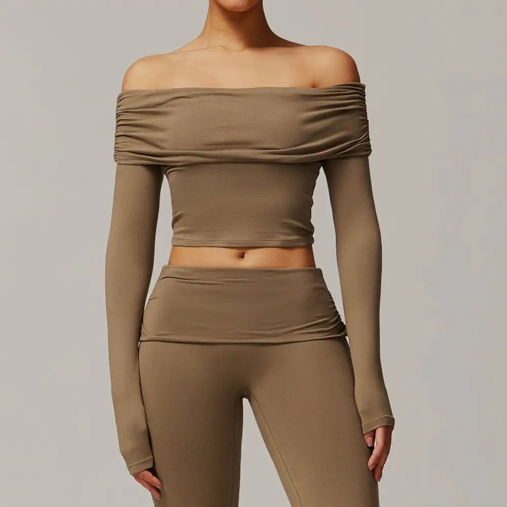 Taupe off-the-shoulder crop top and leggings set.