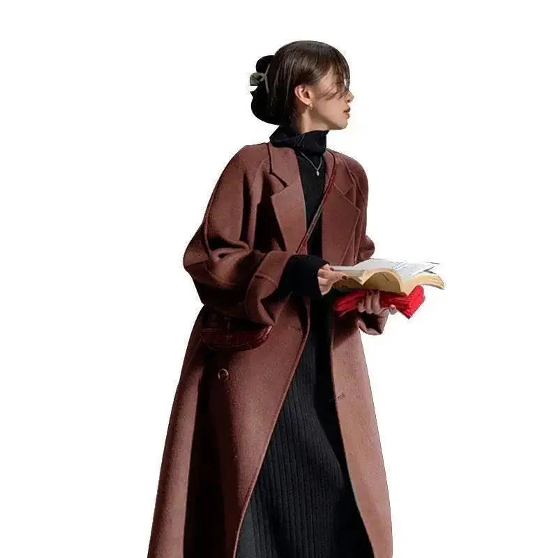 Woman’s long brown coat.