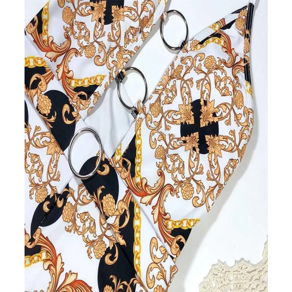 Swimsuit with printed cutout straps