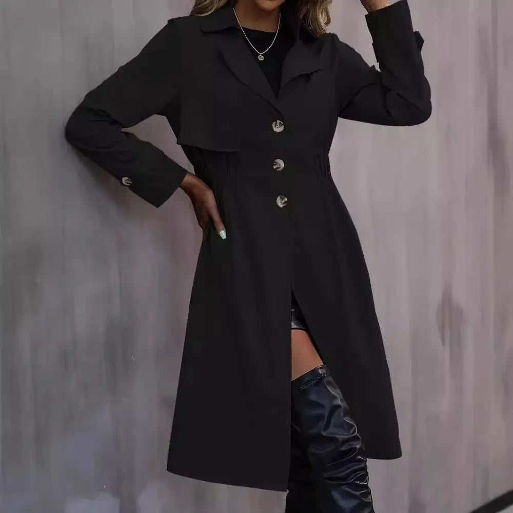 Black buttoned trench coat.
