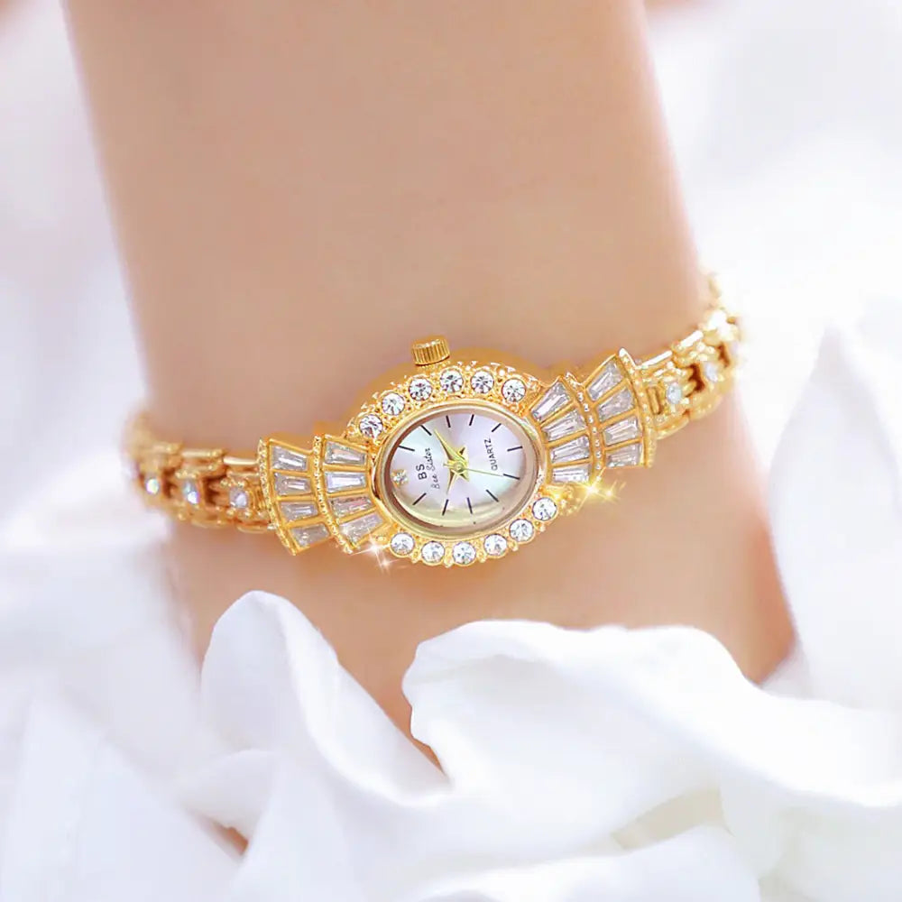 Vintage Chic Ladies Watch with Roman Numerals and Intricate Detailing