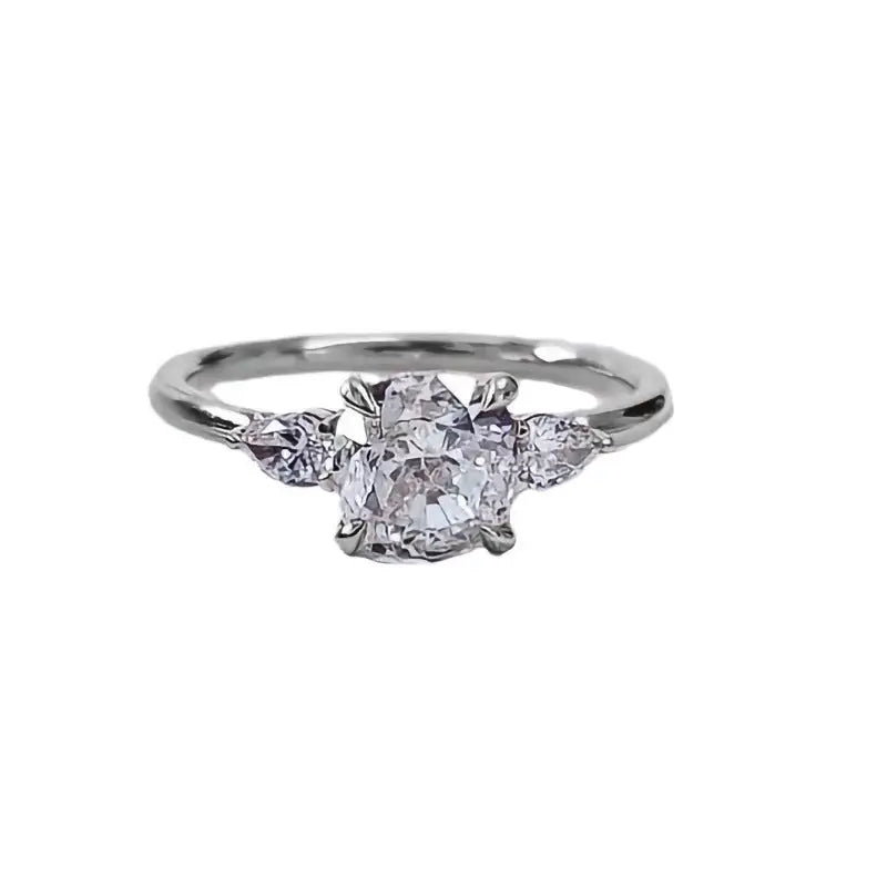 Zircon Elegance: Euro-American Four-Claw Ring