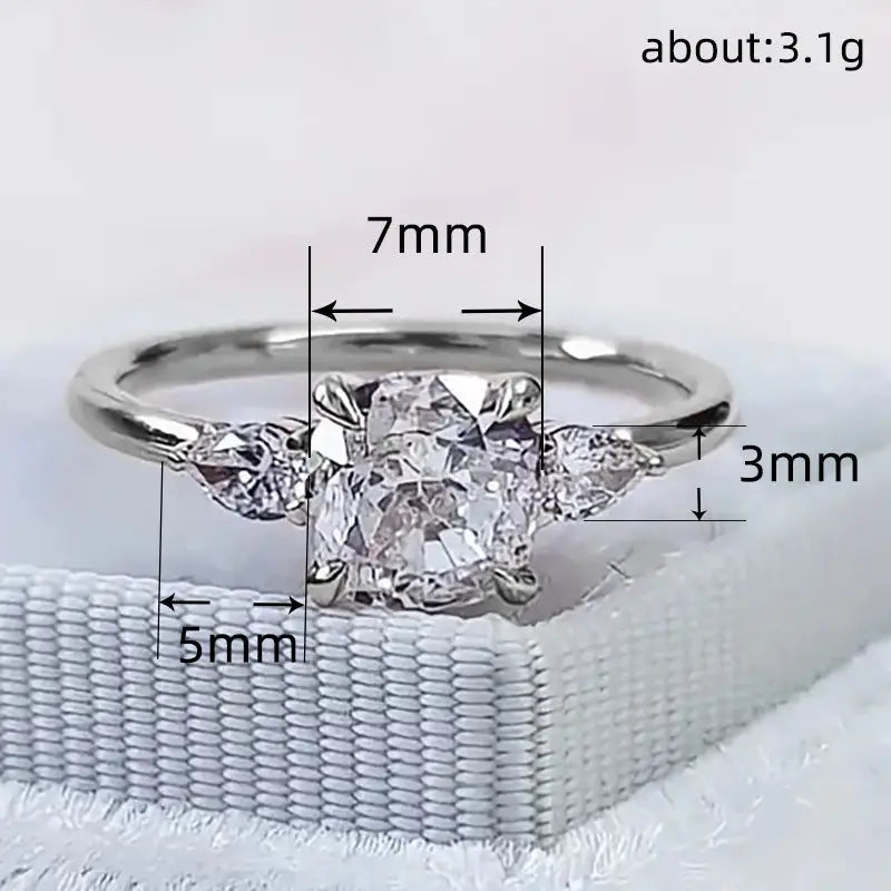 Zircon Elegance: Euro-American Four-Claw Ring