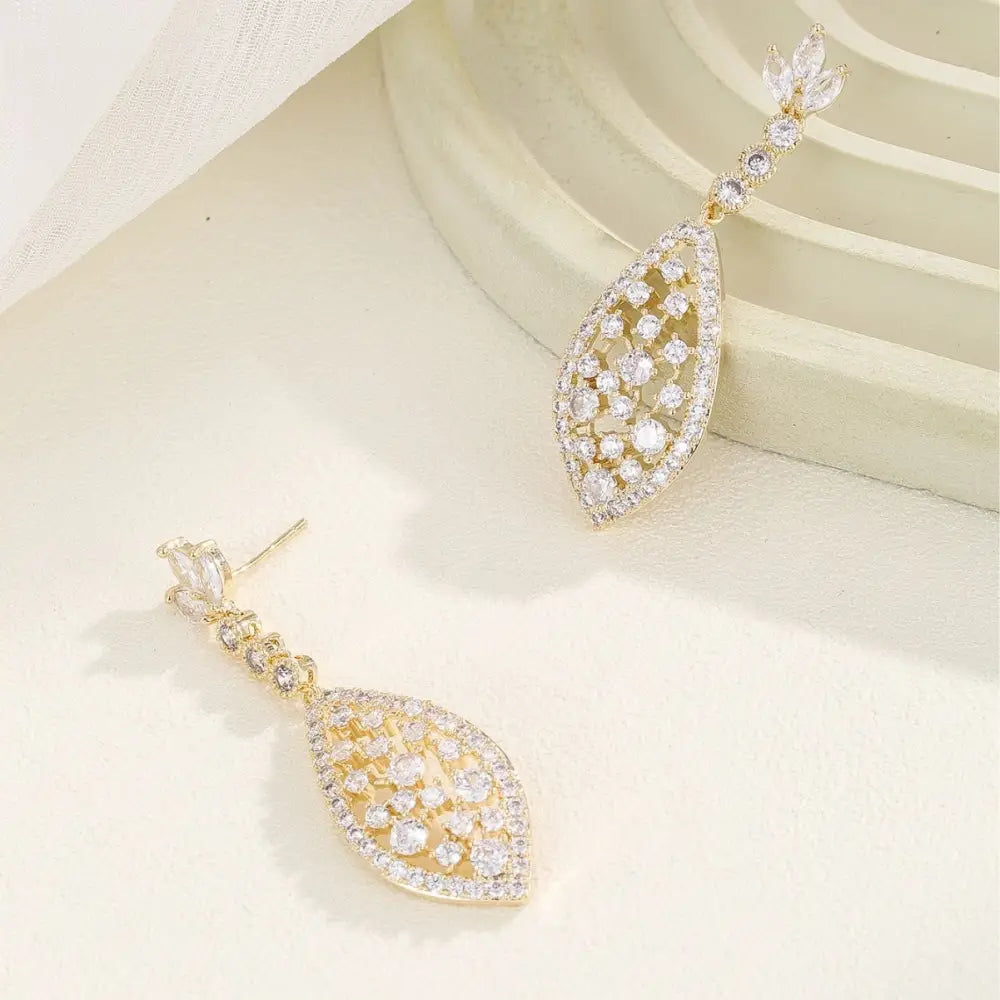 ZirconGlow Hollow Earrings: Trendy Chic Design