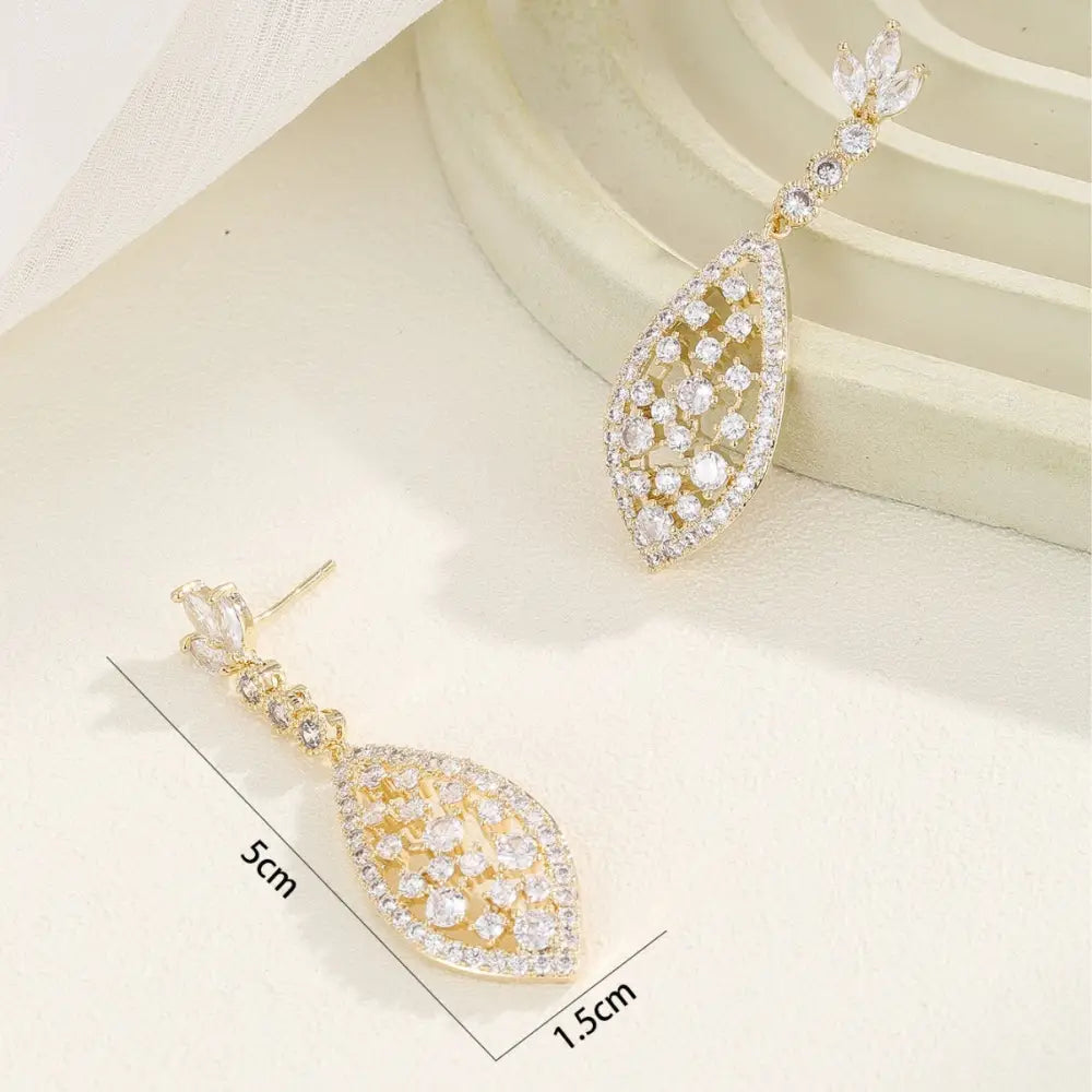 ZirconGlow Hollow Earrings: Trendy Chic Design