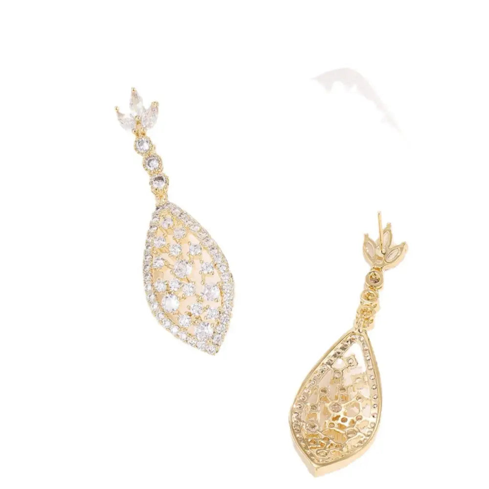 ZirconGlow Hollow Earrings: Trendy Chic Design