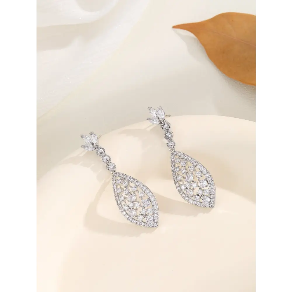ZirconGlow Hollow Earrings: Trendy Chic Design - Silver