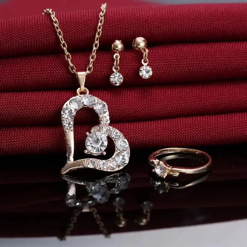RadiantHeart Rhinestone Pendant Set with Heart Shaped Charm - LauBelle