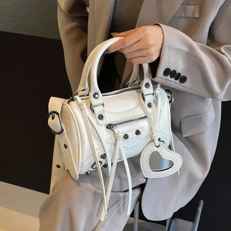 TasselRivet Crossbody Bag with Secure Zipper and Spacious Compartment - LauBelle