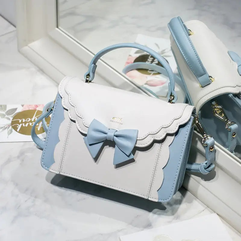 Bow Square Bag with Unique Shape and Front Accent - LauBelle