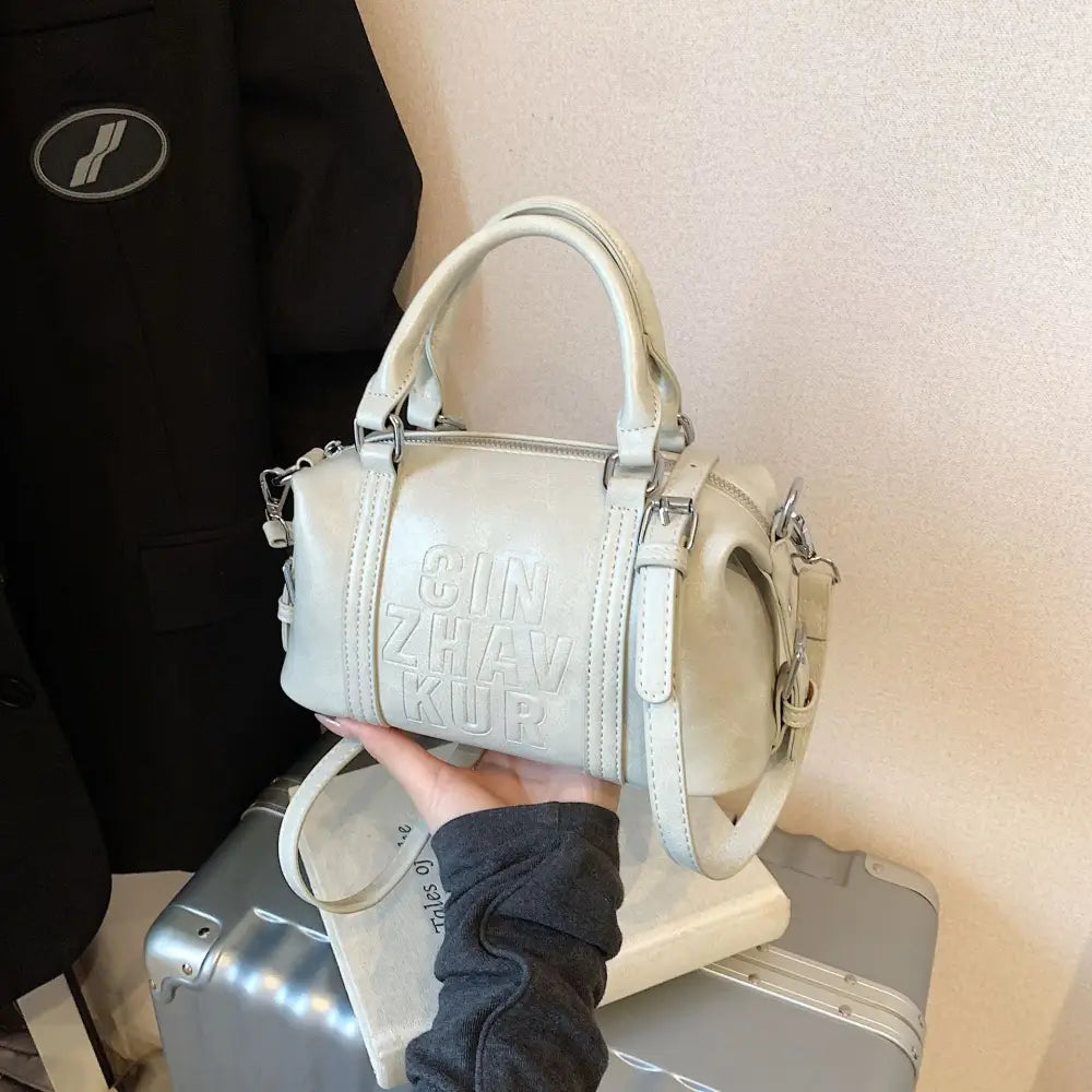 VersaSoft PU Messenger with Pendant & Phone Pocket - LauBelle