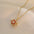 Fashion Rotating Bauhinia Zircon Necklace with Flower Design - LauBelle Brand