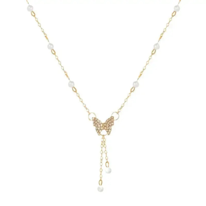 Butterfly Pearl Charm Necklace with Intricate Detailing - LauBelle