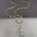 Butterfly Pearl Charm Necklace with Intricate Detailing - LauBelle