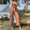 Hollow Strap Jumpsuit with Plunging Neckline and Bold Detailing - LauBelle