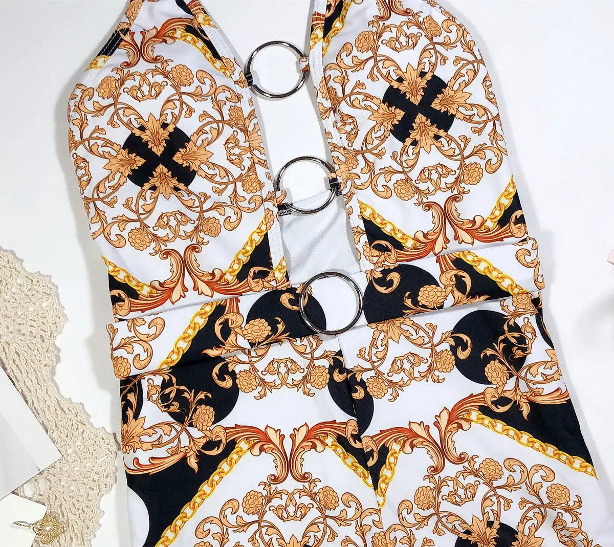 Swimsuit with printed cutout straps